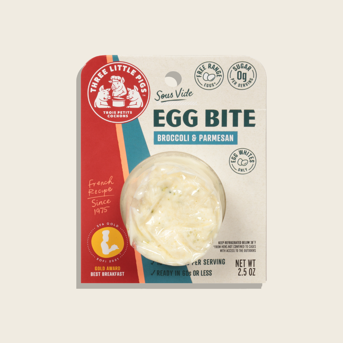 Three Little Pigs Egg Bite packaging with broccoli and parmesan flavor on a beige background