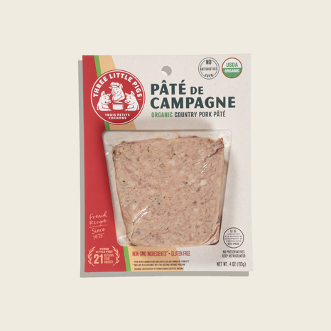 Package of Three Little Pigs Organic Pâté de Campagne on a beige background