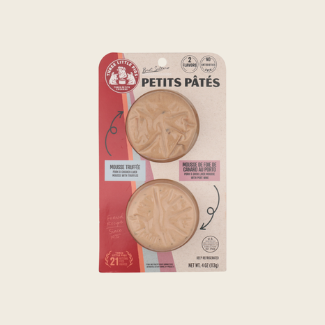 Packaging of Petits Patès with two round medaillons of Pate on a beige background