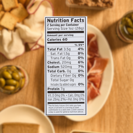 Nutrition facts label on a wooden table with food items