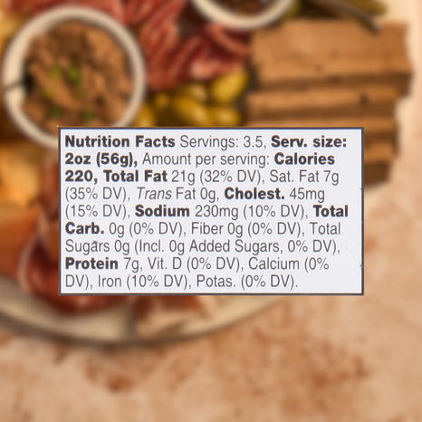 Nutrition facts label on a blurred background of food items