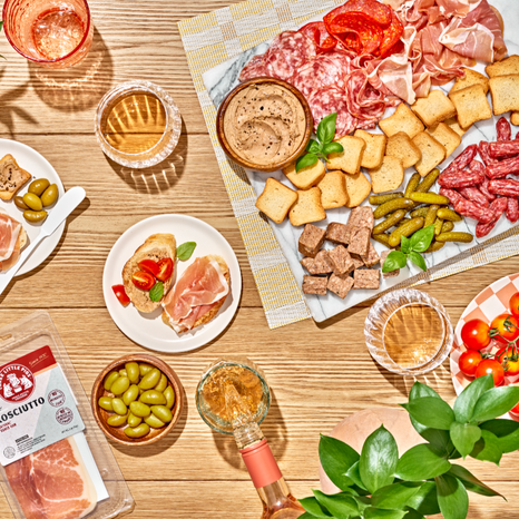 A delightful assortment that includes our Saucisson Sec, Prosciutto, Cornichons, Pâté de Campagne, Rillettes de Canard, Petit Salami, & more. Enjoy the vibrant flavors and handcrafted quality that make each bite a summer celebration worth sharing.